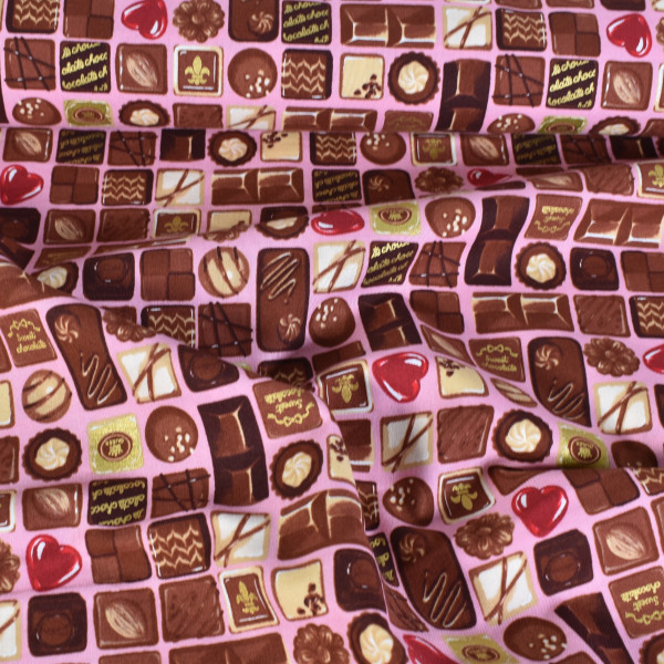 Patchworkstoff Pralinen Süsses Chocolate Box rosa